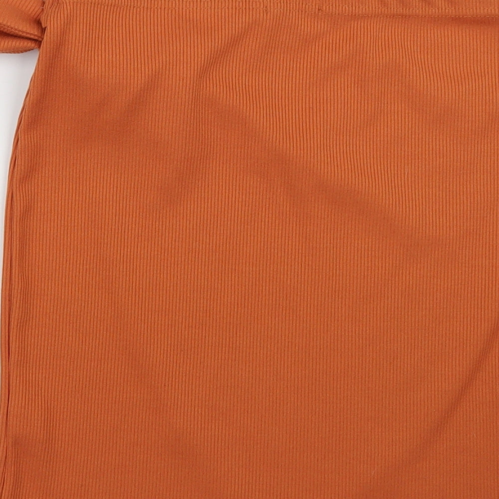 Brand and care label for PRETTYLITTLETHING women’s orange polyester a-line skirt, size UK 12