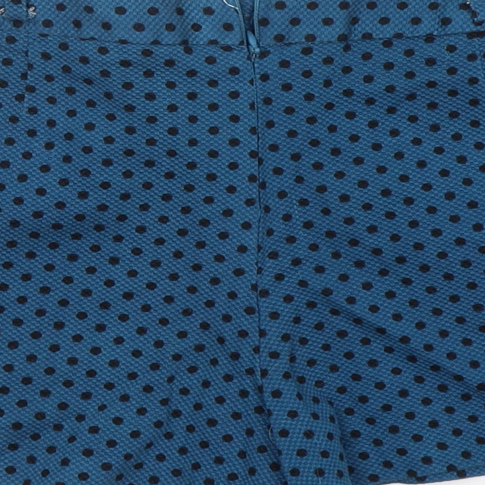 Brand and care label for Atmosphere women’s green polka dot cotton hot pants shorts, size UK 12, 3-inch leg regular