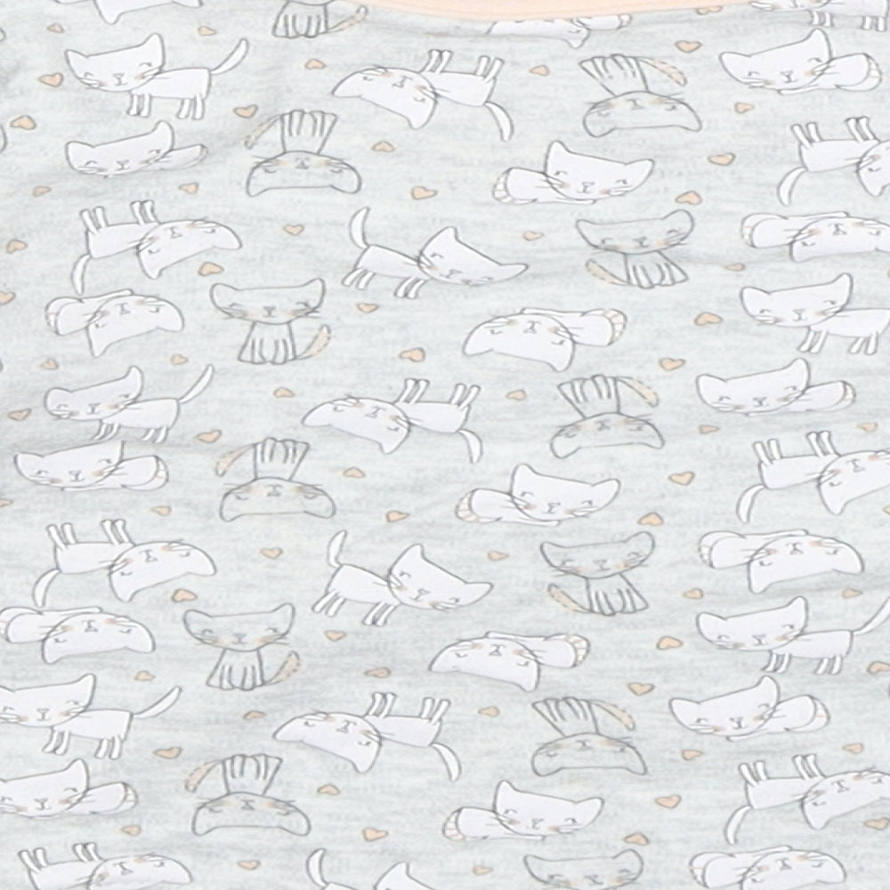 Brand and care label for Primark girls’ grey animal print cotton jumper, size 18-24, months