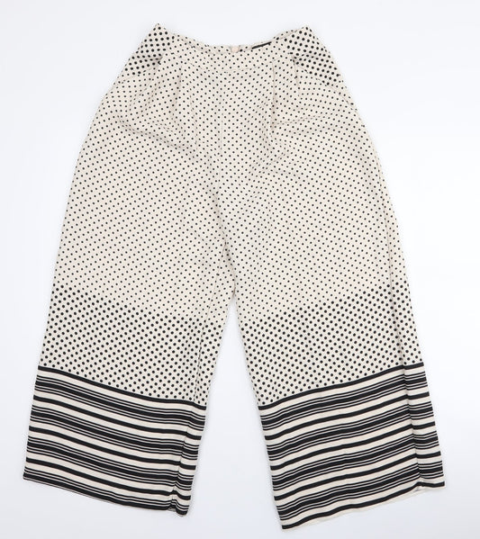 Additional front view of Topshop women’s ivory polka dot polyester trousers, size UK 8, 23-inch leg regular zip - culotte