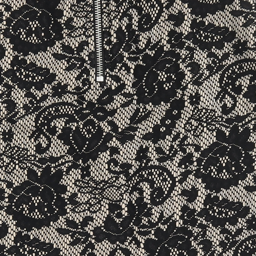 Brand and care label for H&M women’s black floral polyester a-line skirt, size UK 8, zip