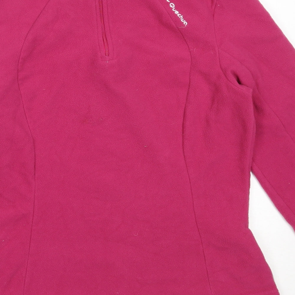 Brand and care label for Decathlon women’s pink polyester henley sweatshirt, size M