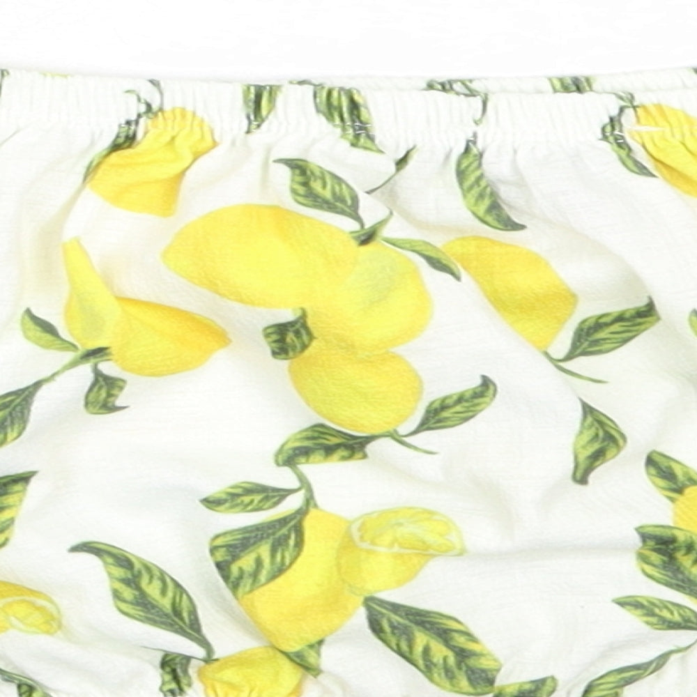 Brand and care label for Primark women’s ivory polyester cropped blouse, size XS, off the shoulder - lemon