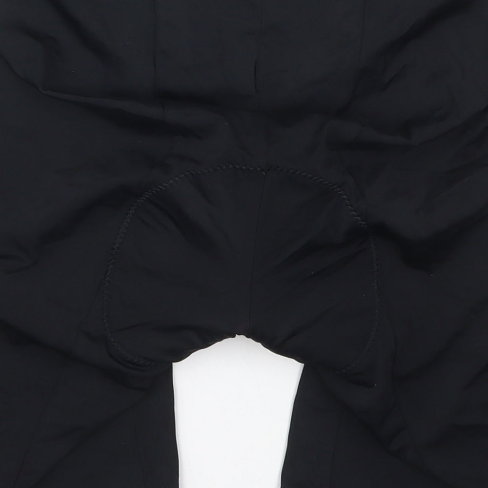 Brand and care label for Preworn men’s black nylon biker shorts, size M, 6-inch leg regular