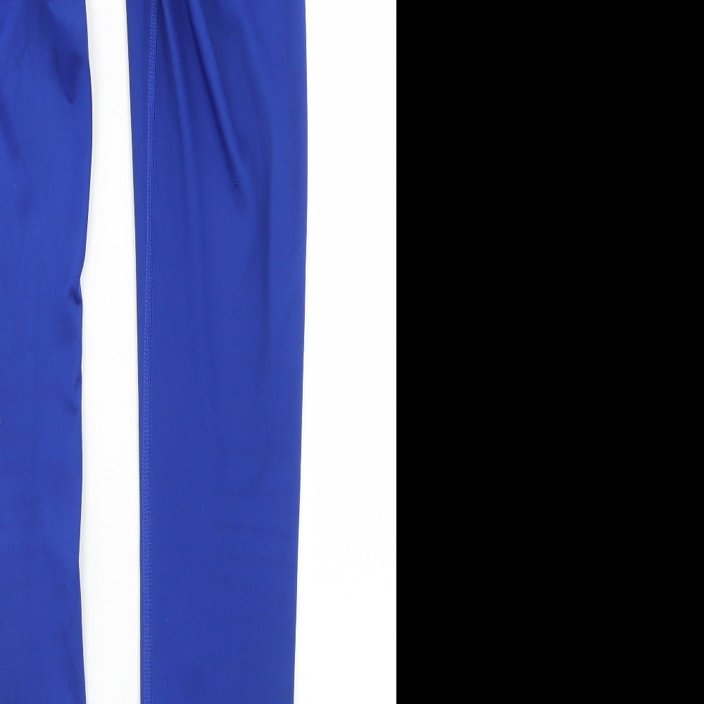 Brand and care label for Reebok women’s blue polyester compression leggings, size XS, 26-inch leg regular