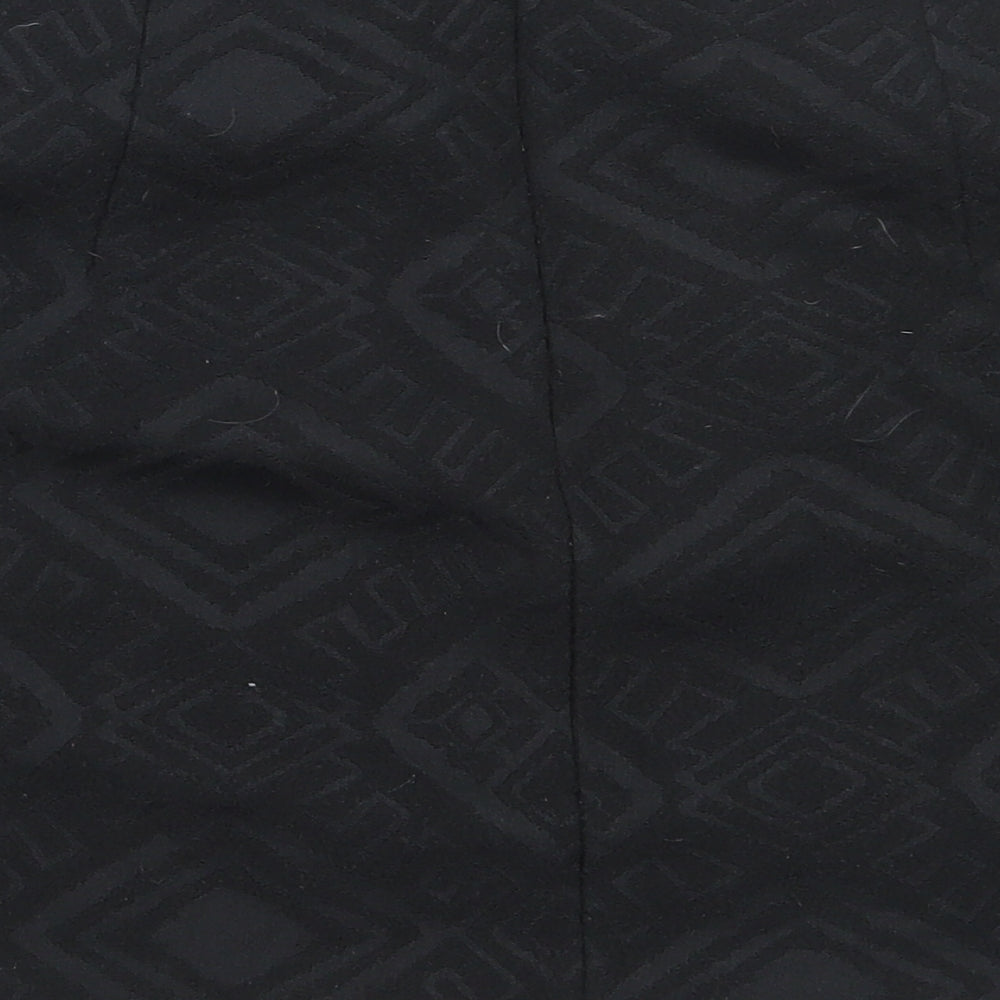 Brand and care label for Next women’s black cotton mini skirt, size UK 38