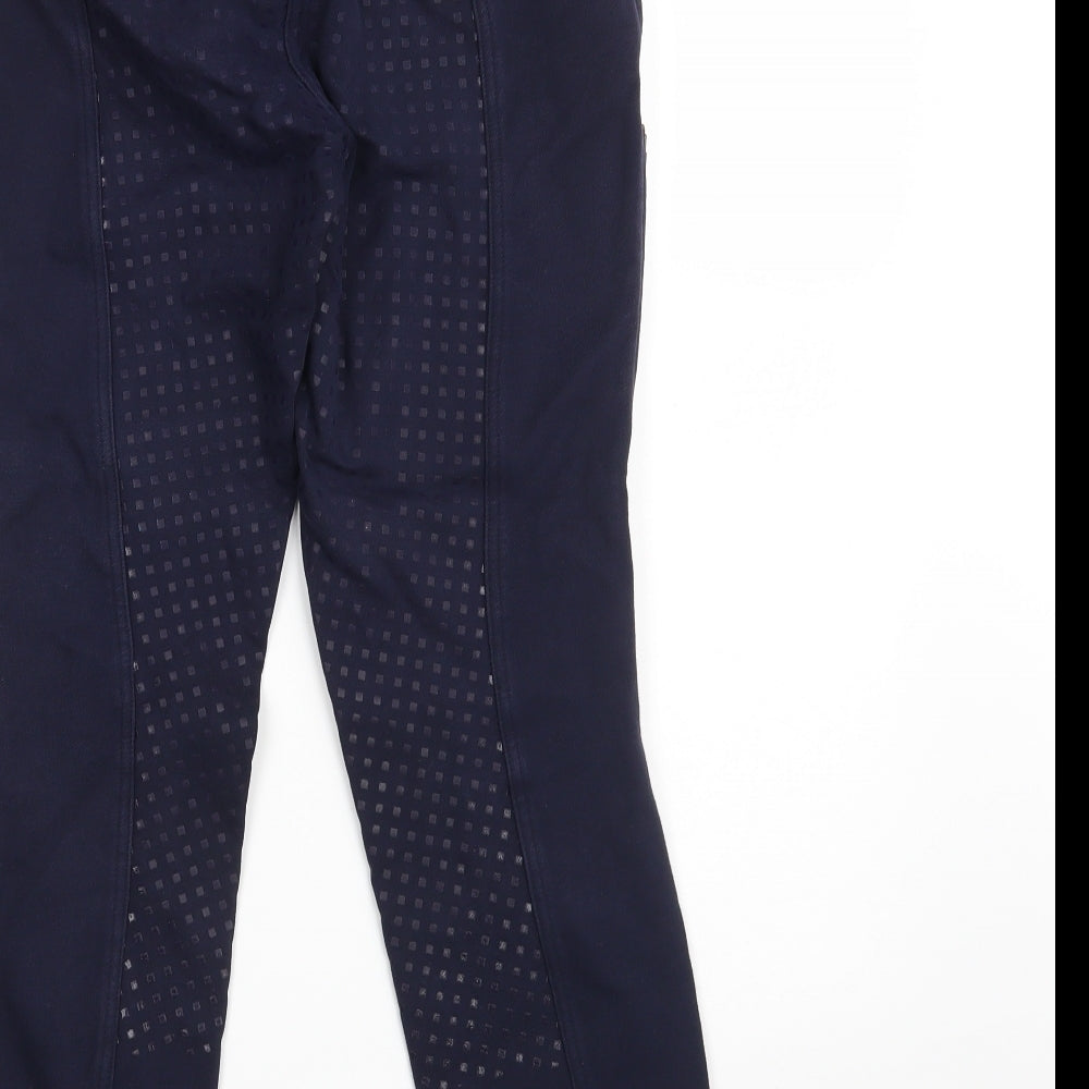Brand and care label for DECATHLON women’s blue cotton compression trousers, size S, 26-inch leg slim zip