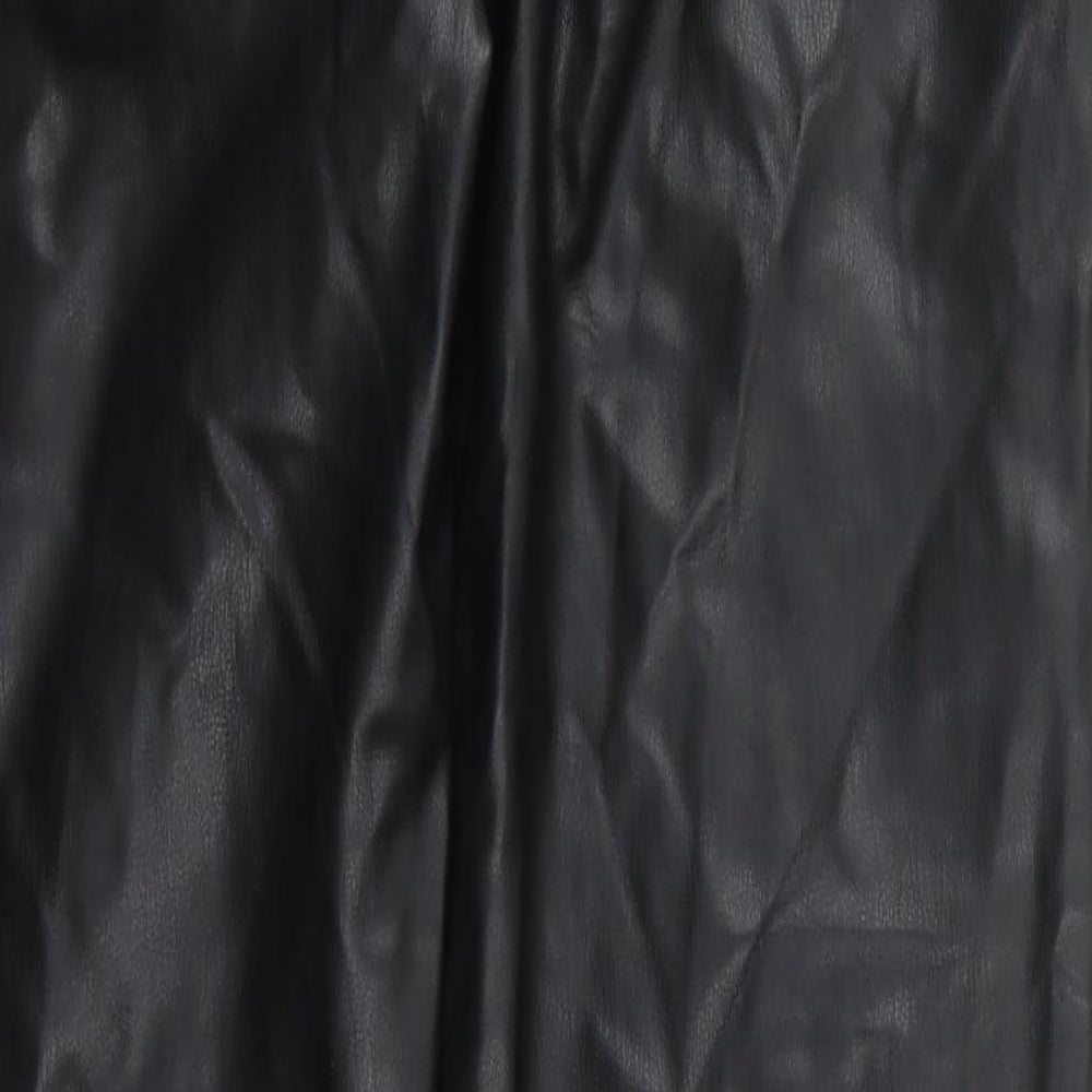 Brand and care label for Preworn men’s black polyurethane trousers, size 29, in, 32-inch leg regular button