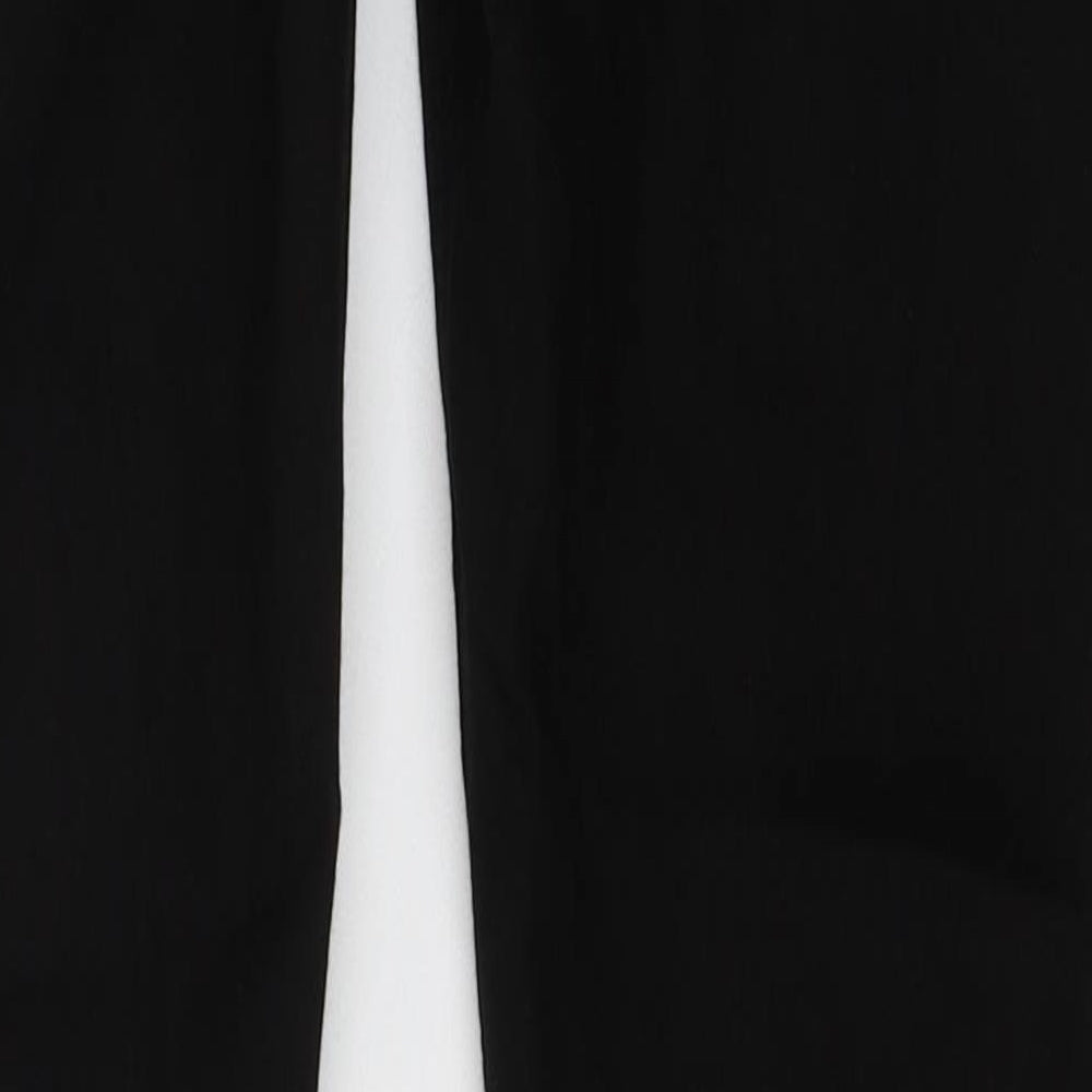 Brand and care label for ASOS women’s black cotton skinny jeans, size UK 29, in, 29-inch leg slim - ripped detail