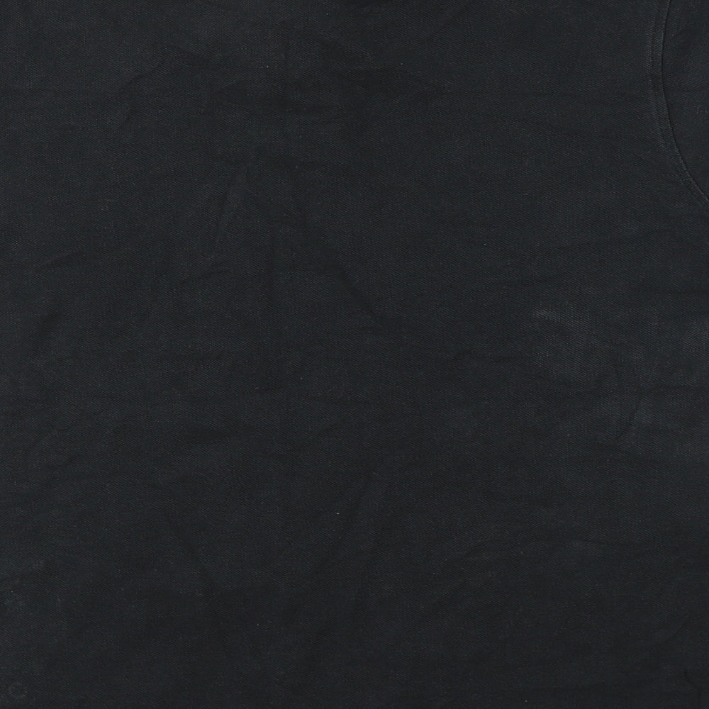 Brand and care label for Duck and Cover men’s black cotton polo, size S, collared