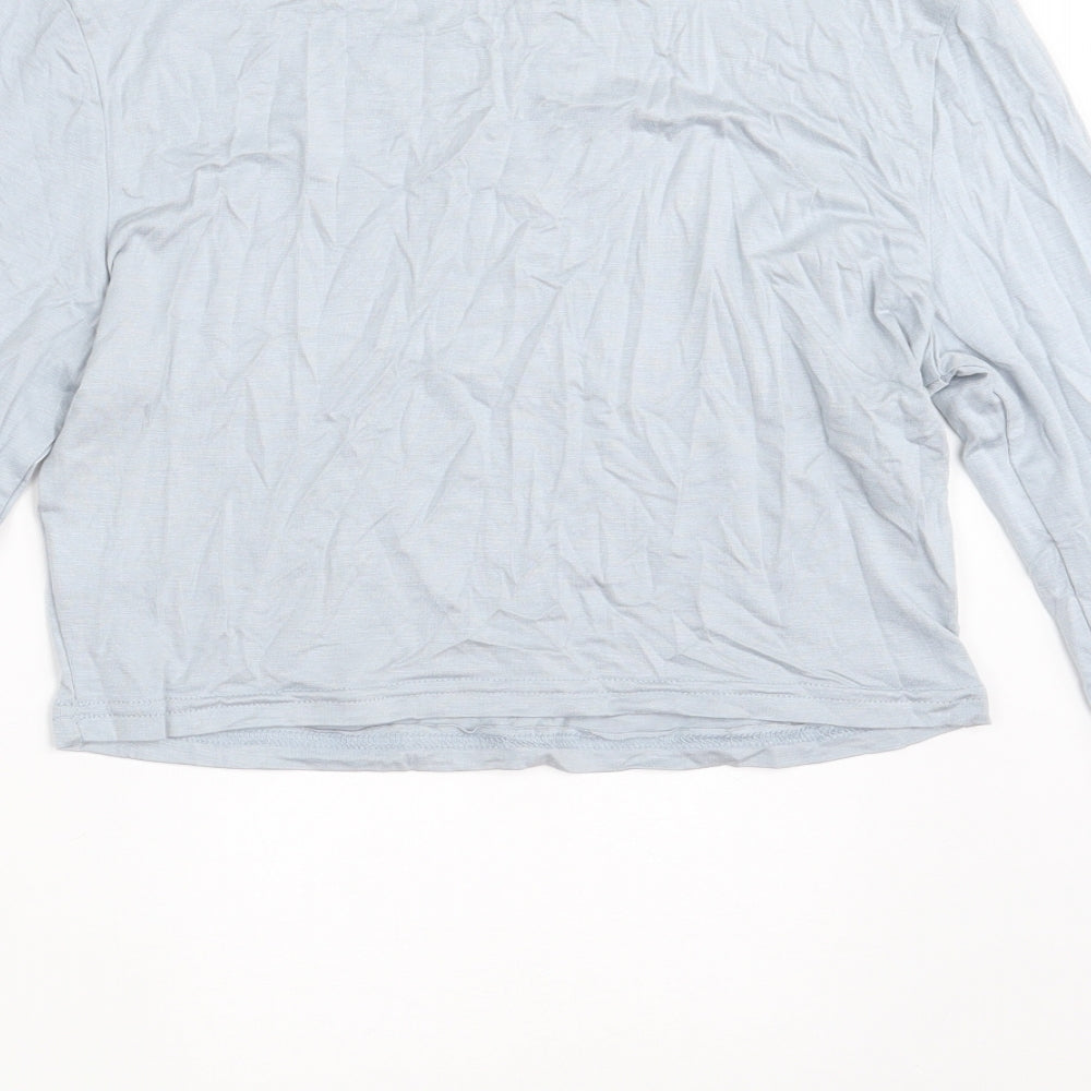 Brand and care label for SHEIN women’s blue cropped t-shirt, size L, round neck