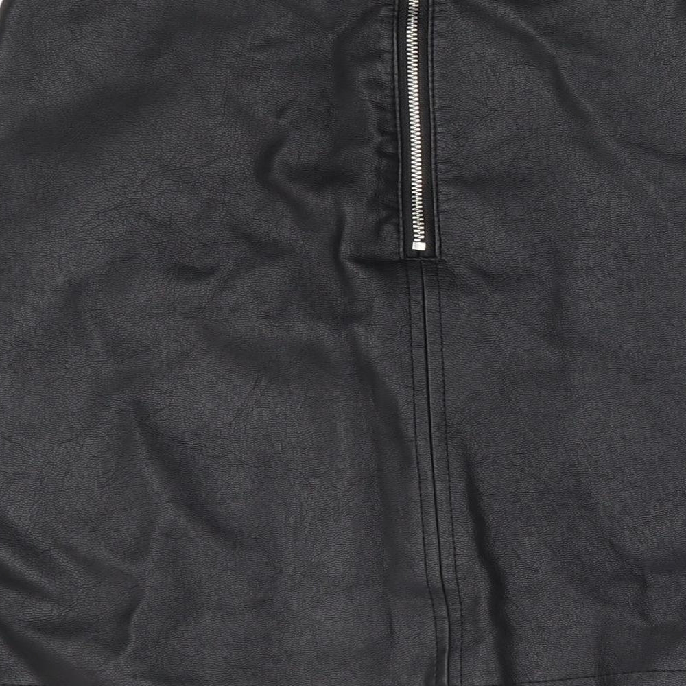 Brand and care label for Primark women’s black polyester a-line skirt, size UK 6, zip