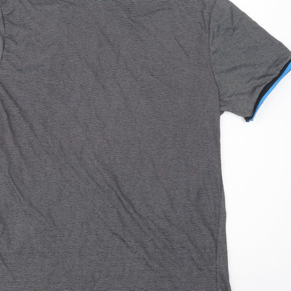 Brand and care label for Urban Spirit men’s grey striped cotton polo, size S, collared button