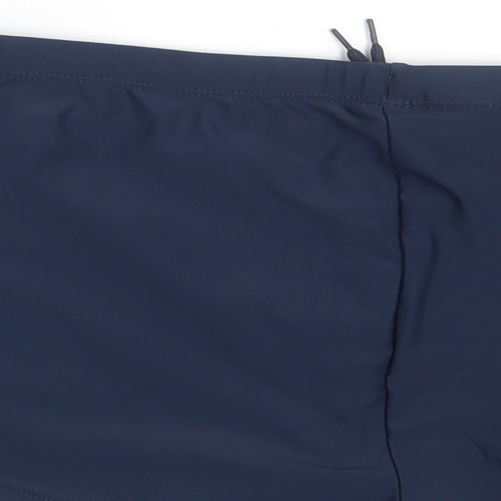 Brand and care label for Dunnes women’s blue nylon sweat shorts, size M, slim - swimwear