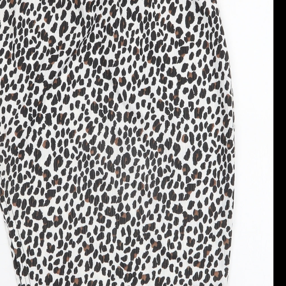 Brand and care label for PRETTYLITTLETHING women’s multicoloured animal print polyester mini skirt, size UK 8