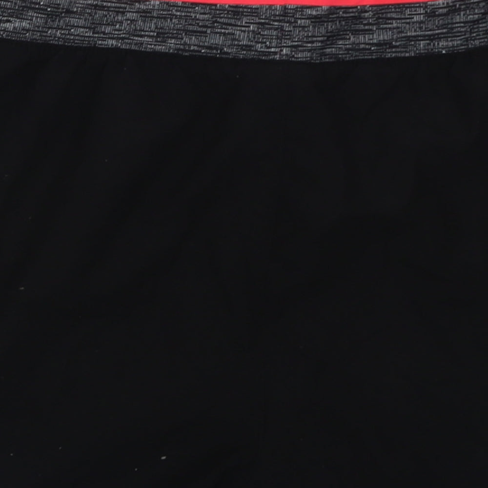 Brand and care label for DECATHLON women’s black polyester sweat shorts, size L, 3-inch leg regular pull on