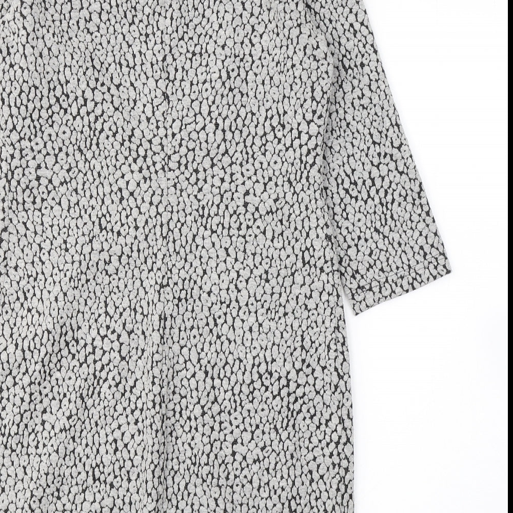 Brand and care label for Taifun women’s green polka dot polyester a-line, size UK 10, round neck pullover
