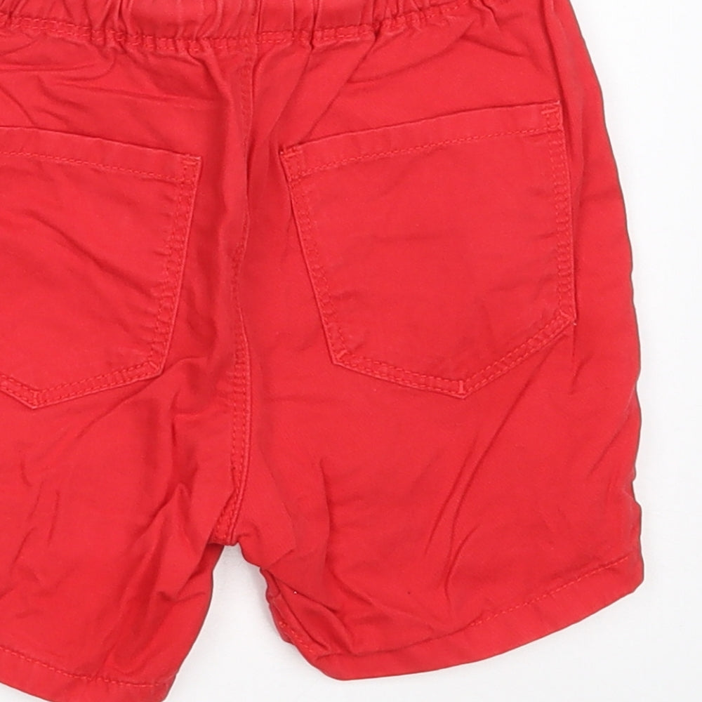 Brand and care label for Next boys’ red 100% cotton chino shorts, size 2, years regular drawstring
