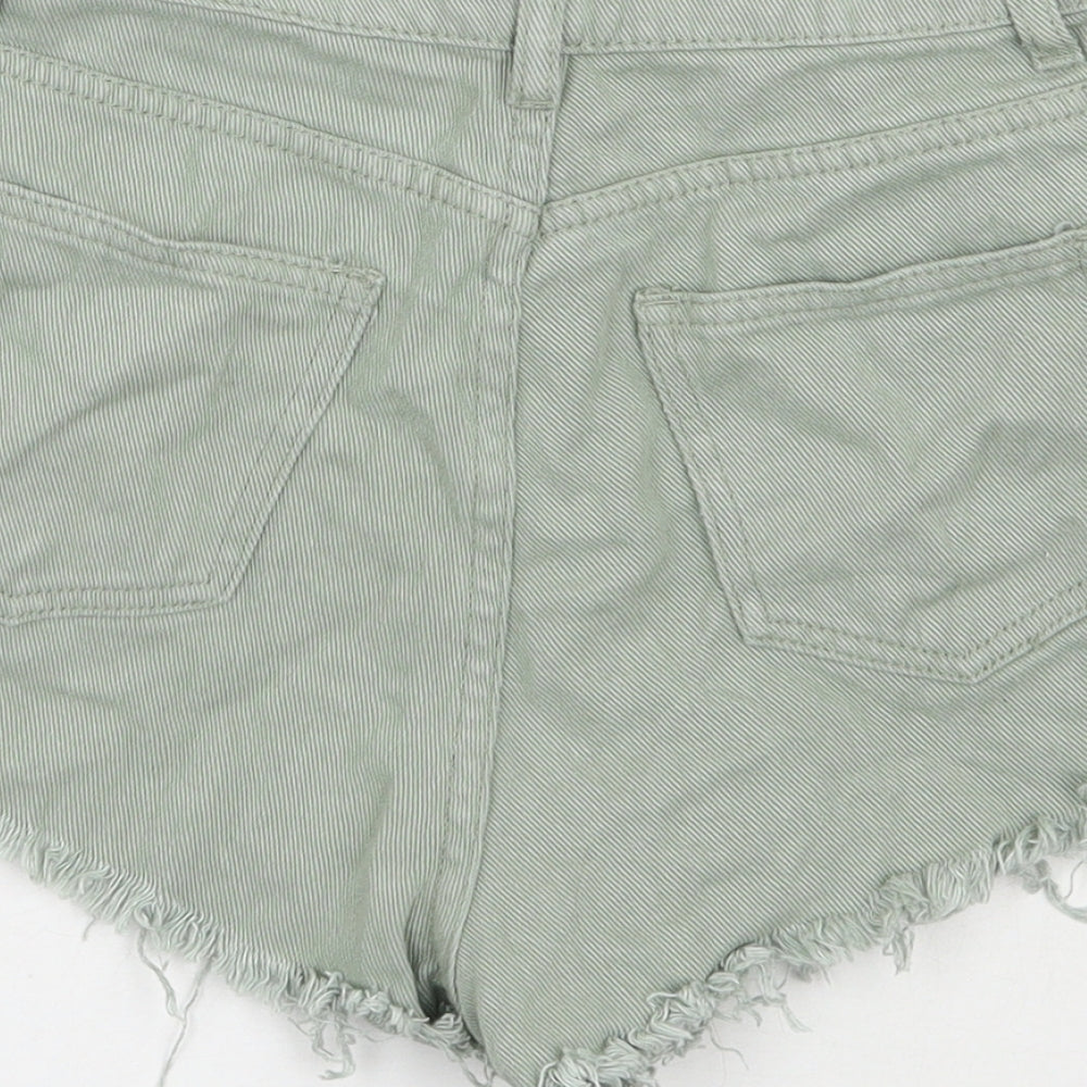 Brand and care label for SHEIN women’s green cotton hot pants shorts, size S, 3-inch leg regular zip