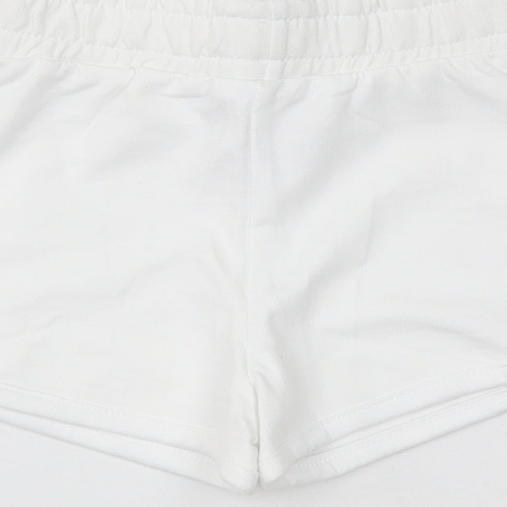 Brand and care label for Dunes girls’ white cotton sweat shorts, size 5, years regular drawstring