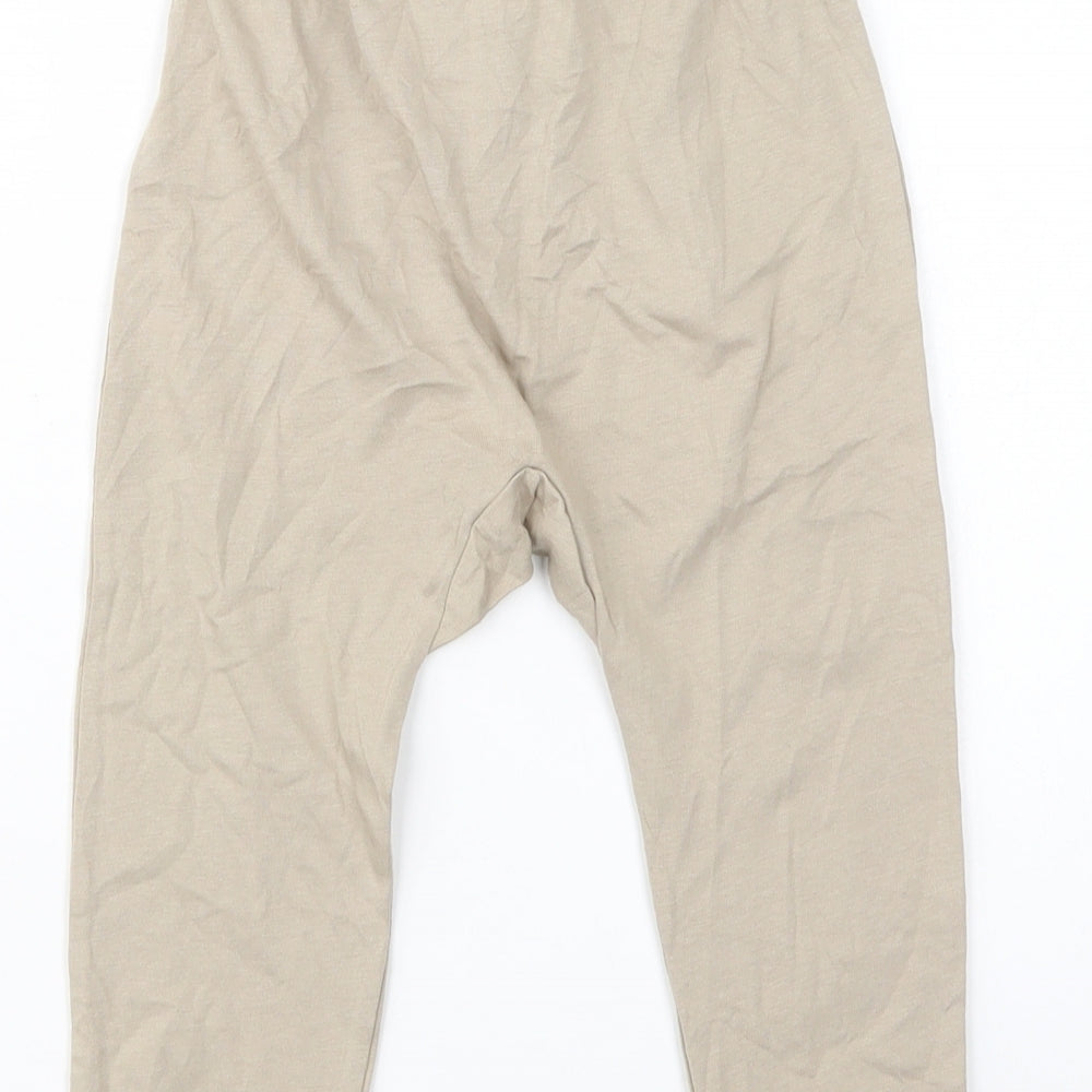 Brand and care label for H&M girls’ beige cotton jogger trousers, size 2-3, years regular drawstring