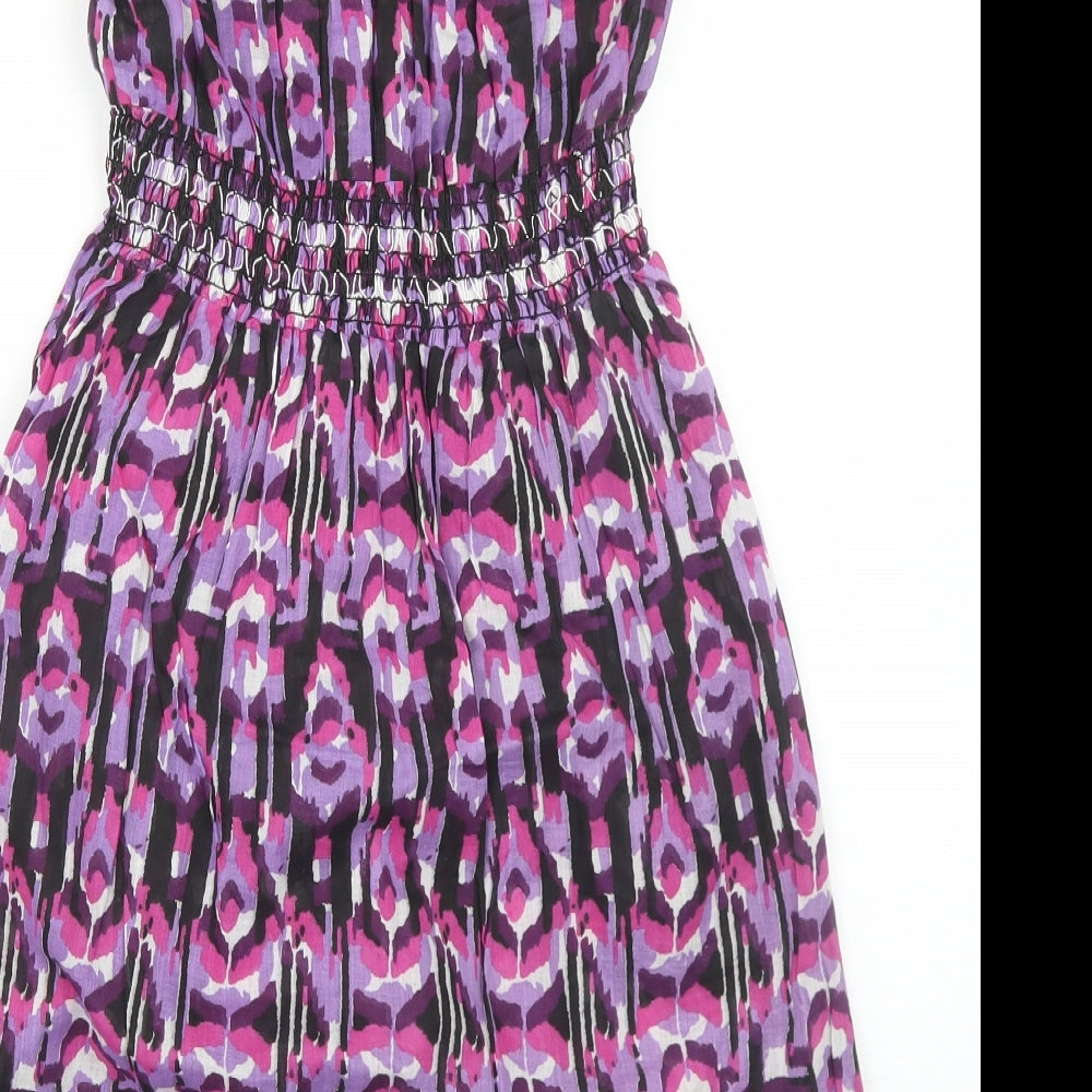 Brand and care label for Ocean Club women’s purple animal print cotton skater dress, size UK 8, round neck