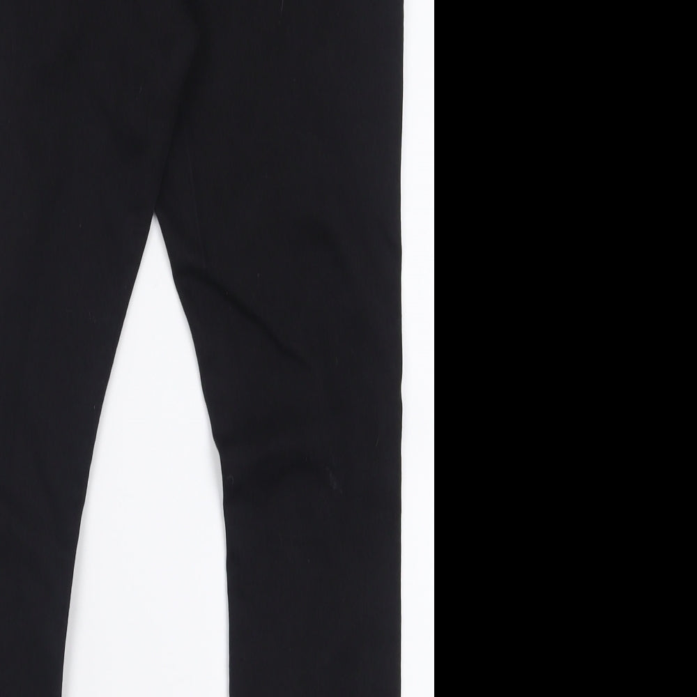 Brand and care label for Boohoo women’s black cotton skinny jeans, size UK 14, 27-inch leg regular button