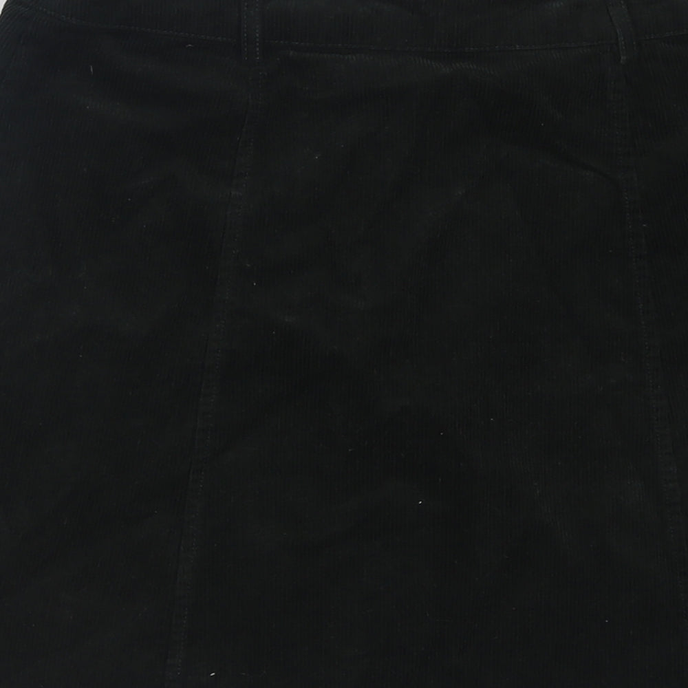 Brand and care label for Oasis women’s green cotton a-line skirt, size UK 10, button