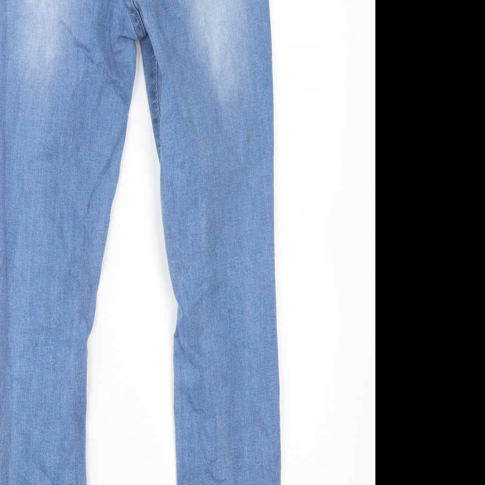 Brand and care label for SHEIN women’s blue cotton skinny jeans, size XS, 30-inch leg regular button