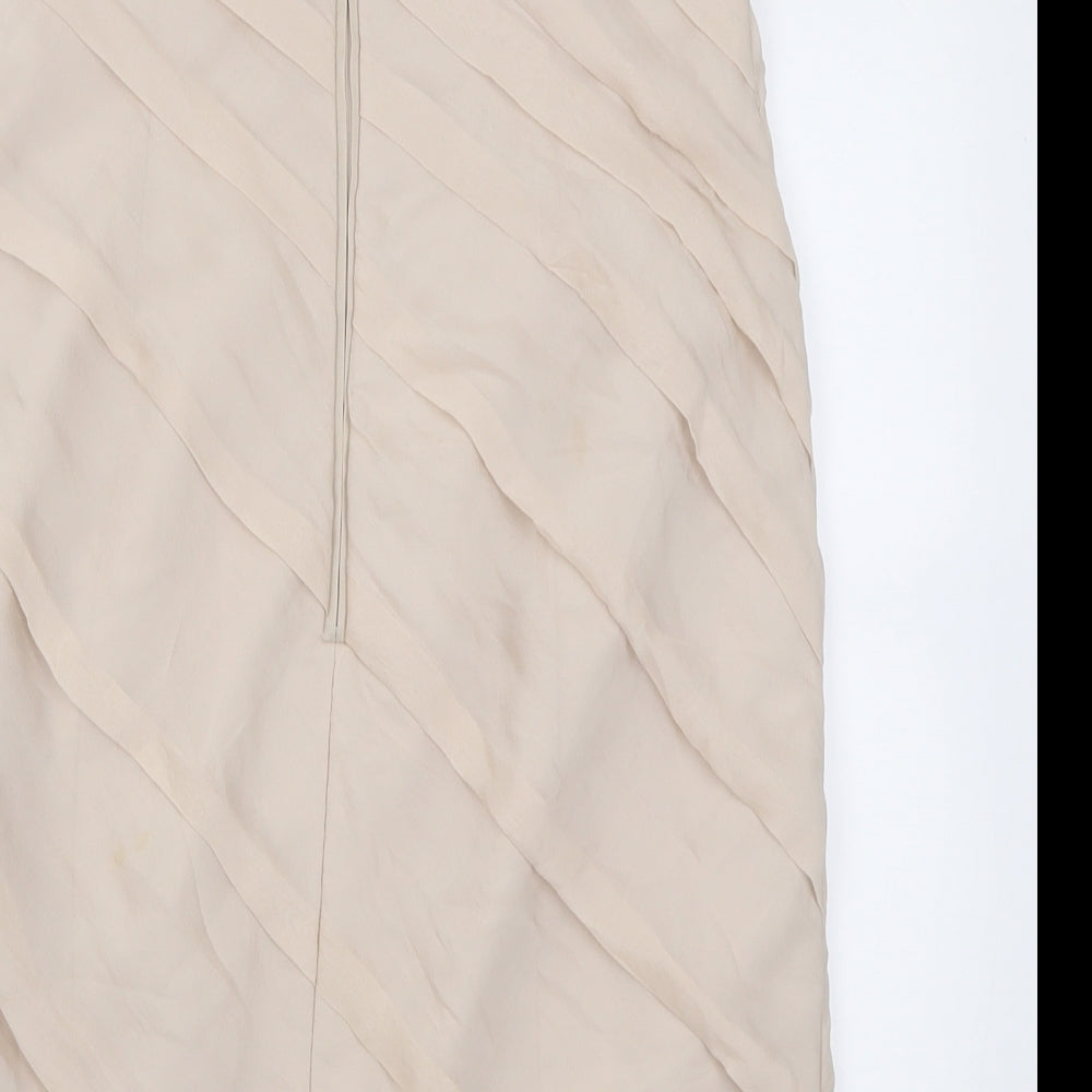 Brand and care label for Coast women’s beige silk bodycon, size UK 12, off the shoulder zip