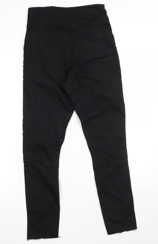 Back view of ASOS women’s black cotton jegging jeans, size UK 26, in, 28-inch leg slim zip