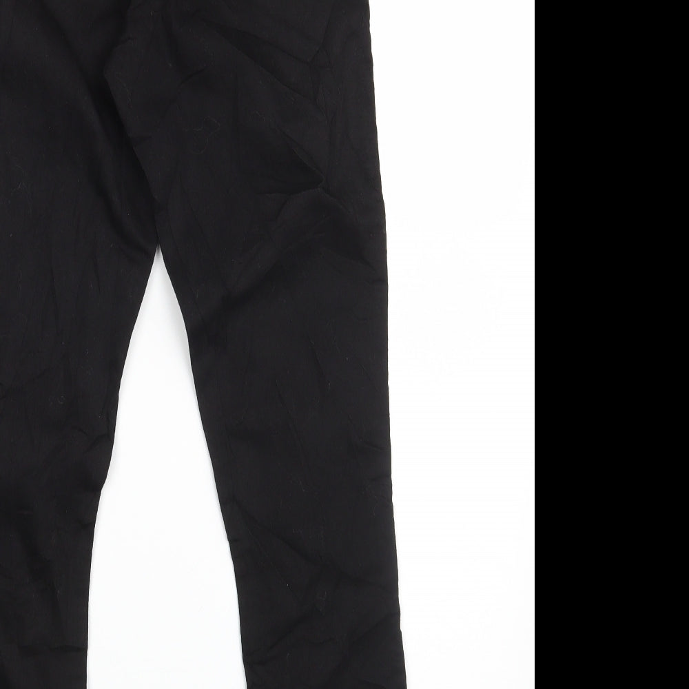 Brand and care label for ASOS women’s black cotton jegging jeans, size UK 26, in, 28-inch leg slim zip