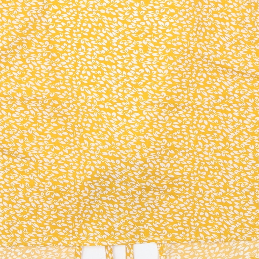 Brand and care label for SHEIN women’s yellow floral jacket, size XS, tie - leaf prints