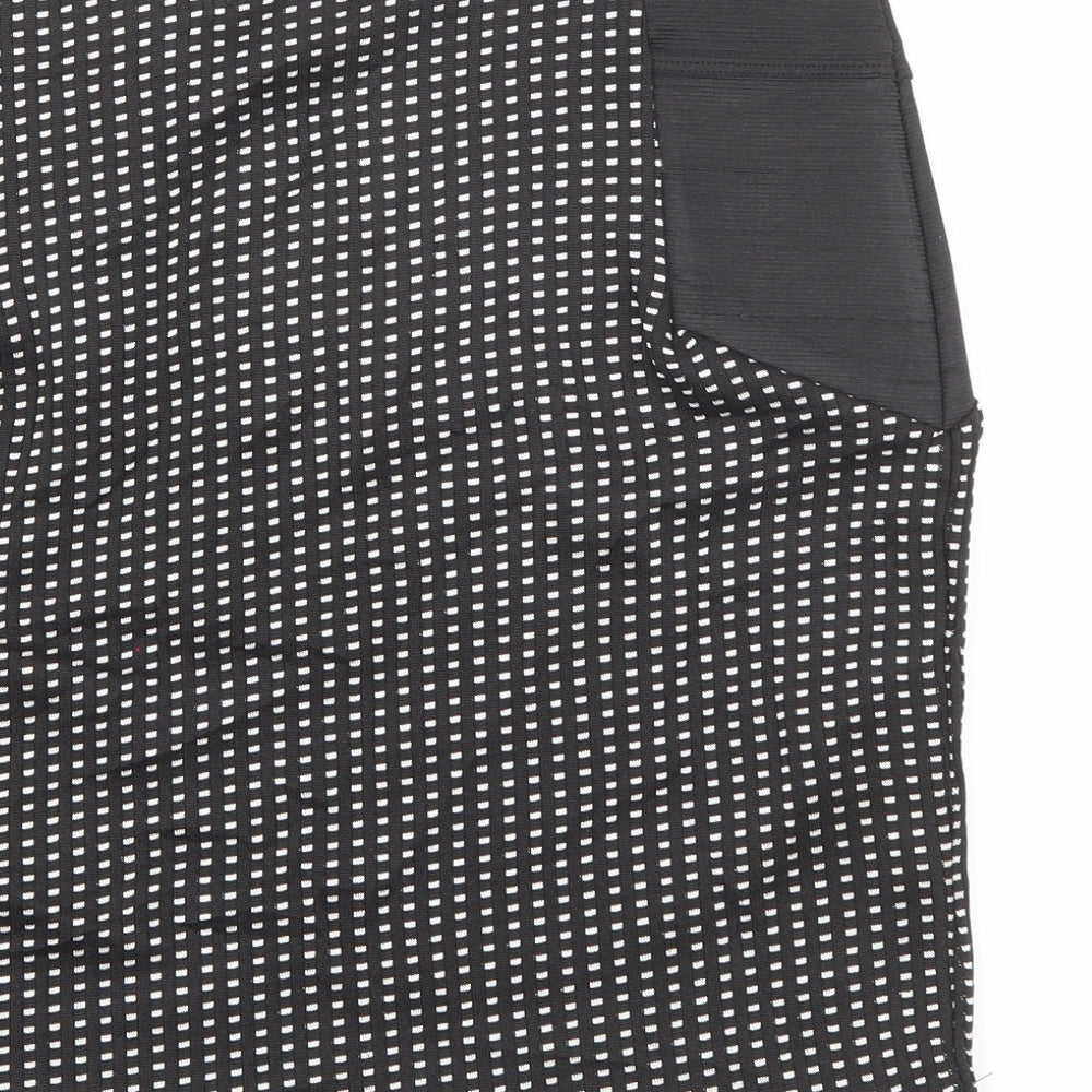 Brand and care label for Cameo Rose women’s black geometric polyester mini skirt, size UK 10