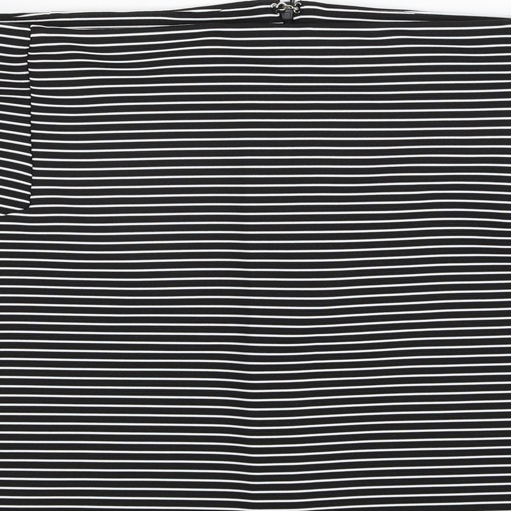 Brand and care label for Topshop women’s black striped polyester a-line skirt, size UK 10, zip