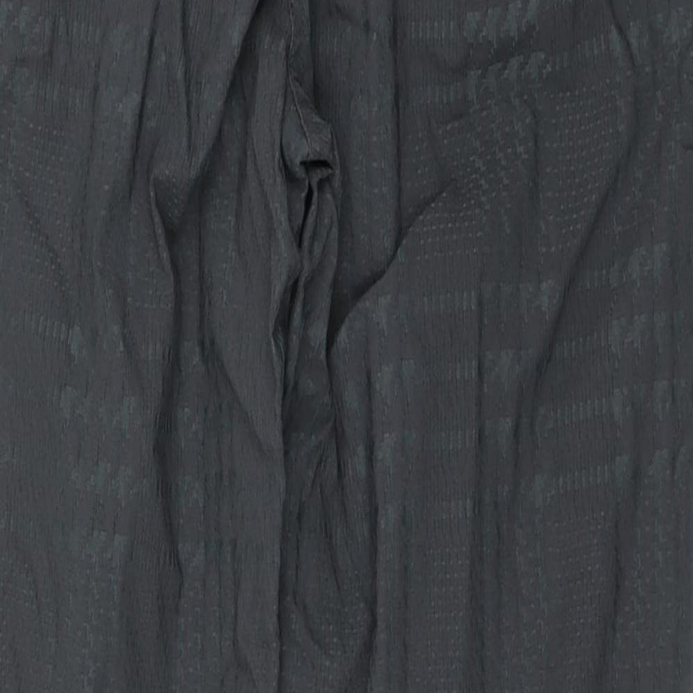 Brand and care label for Masai men’s grey plaid viscose trousers, size L, 29-inch leg regular zip