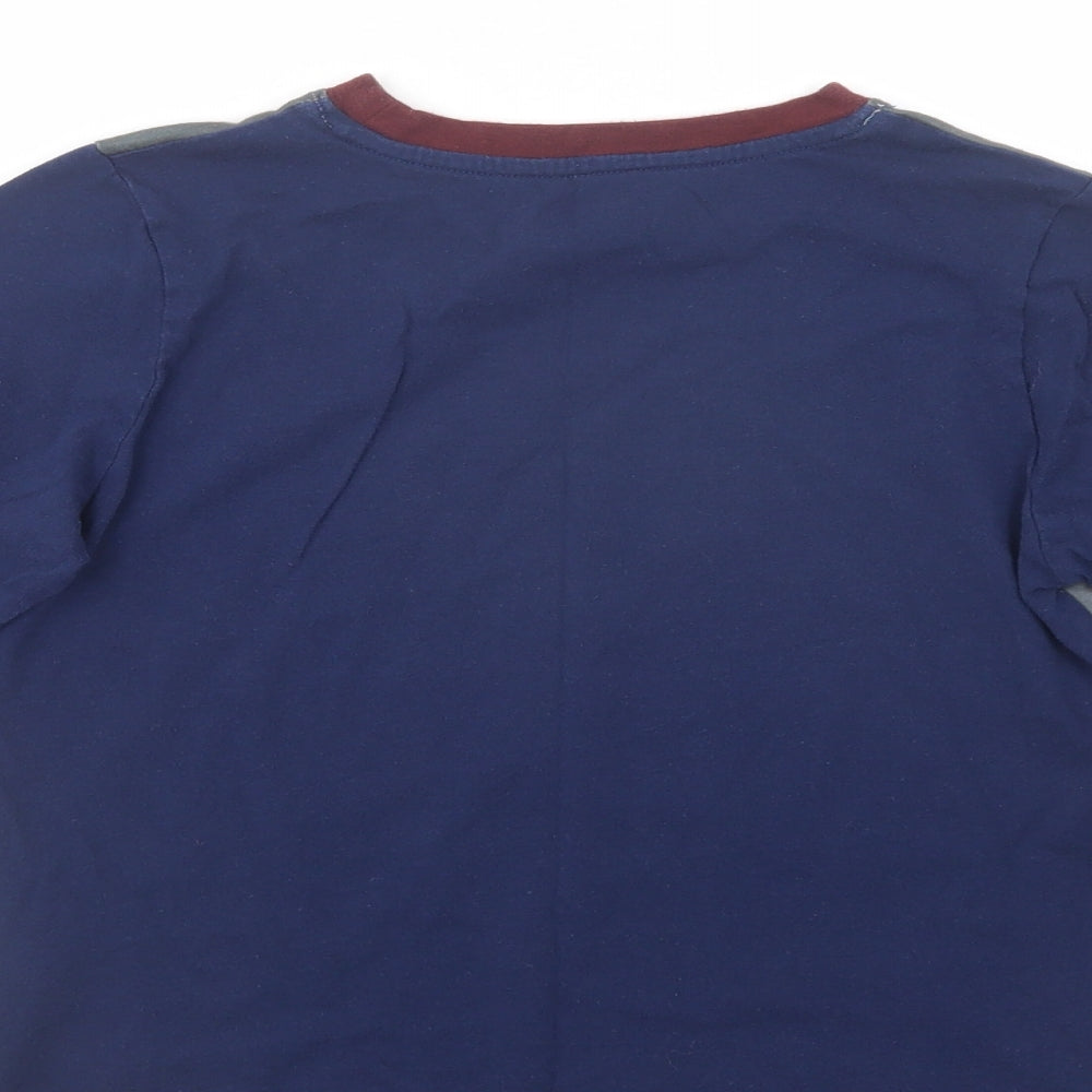 Brand and care label for Character.Com girls’ blue polyester pullover t-shirt, size 8-9, years crew neck pullover - hogwarts