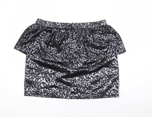 Back view of ASOS women’s black polka dot polyamide straight & pencil skirt, size UK 14, zip