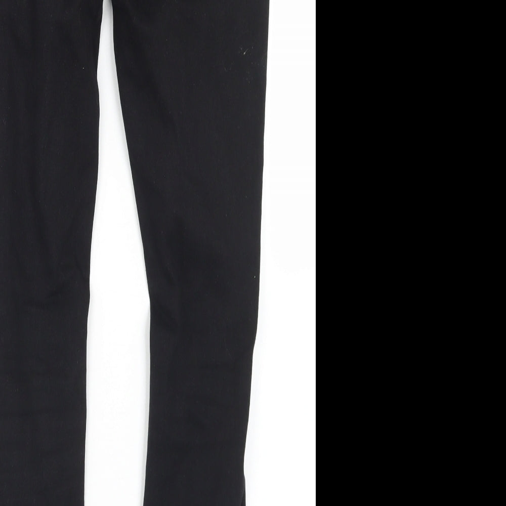 Brand and care label for SHEIN women’s black cotton skinny jeans, size S, 27-inch leg regular button