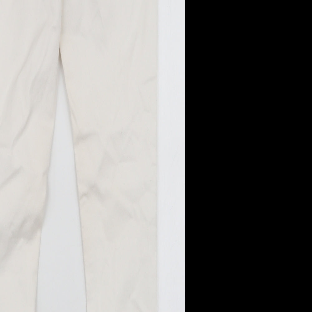 Brand and care label for Dorothy Perkins women’s white cotton skinny jeans, size UK 10, 29-inch leg slim zip