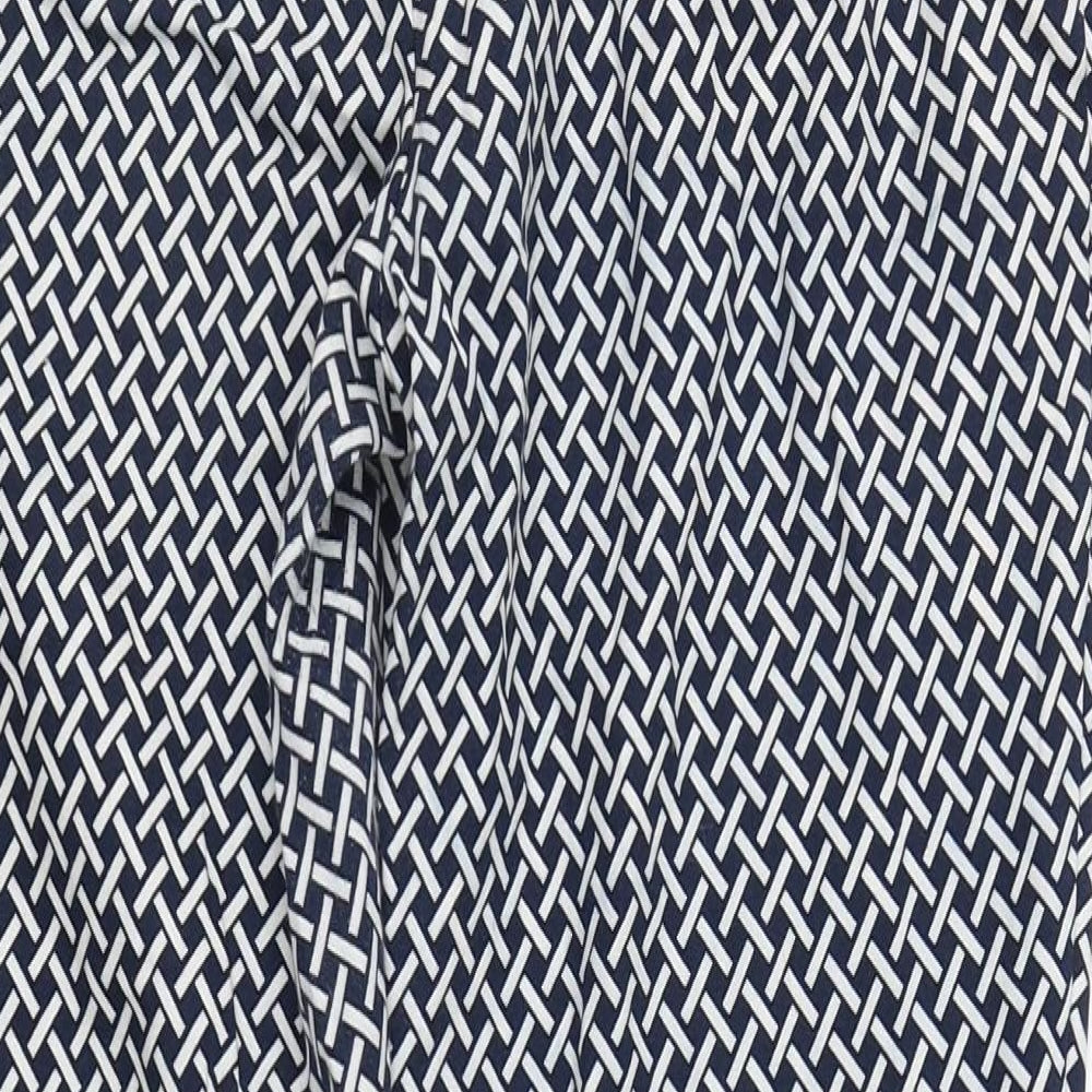 Brand and care label for F&F women’s blue herringbone cotton carrot trousers, size UK 12, 27-inch leg regular zip