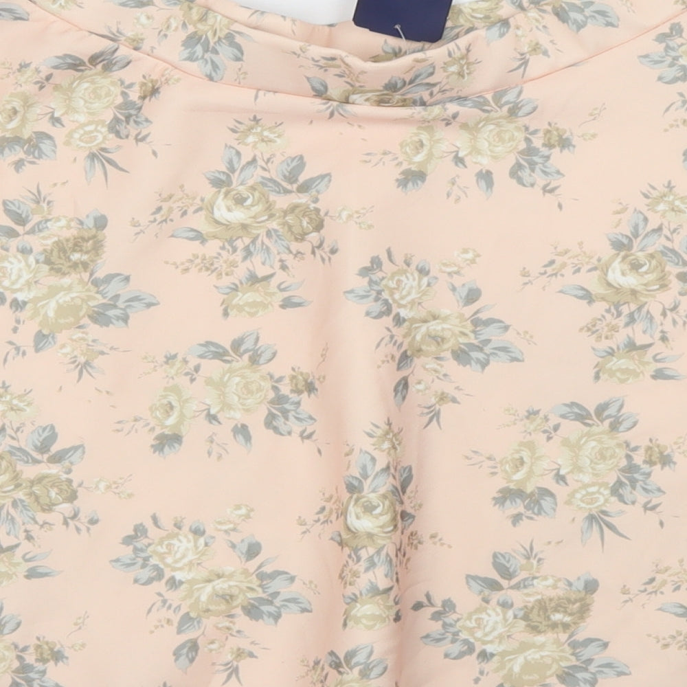 Brand and care label for Forever 21 women’s pink floral polyester skater skirt, size M