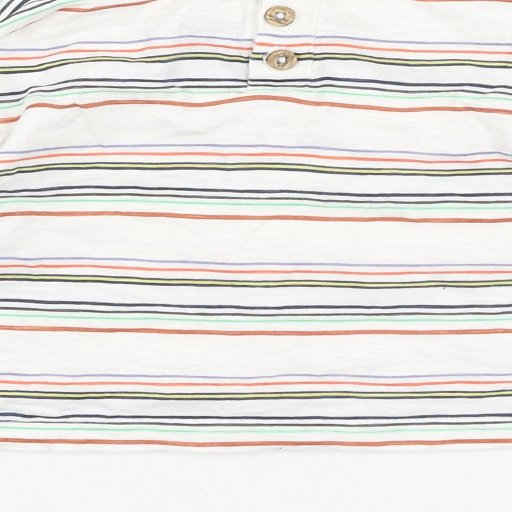 Brand and care label for Dunnes boys’ white striped cotton basic t-shirt, size 3-6, months round neck pullover