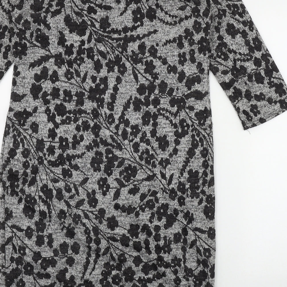 Brand and care label for Blue Vanilla women’s grey floral polyester bodycon, size L, round neck pullover