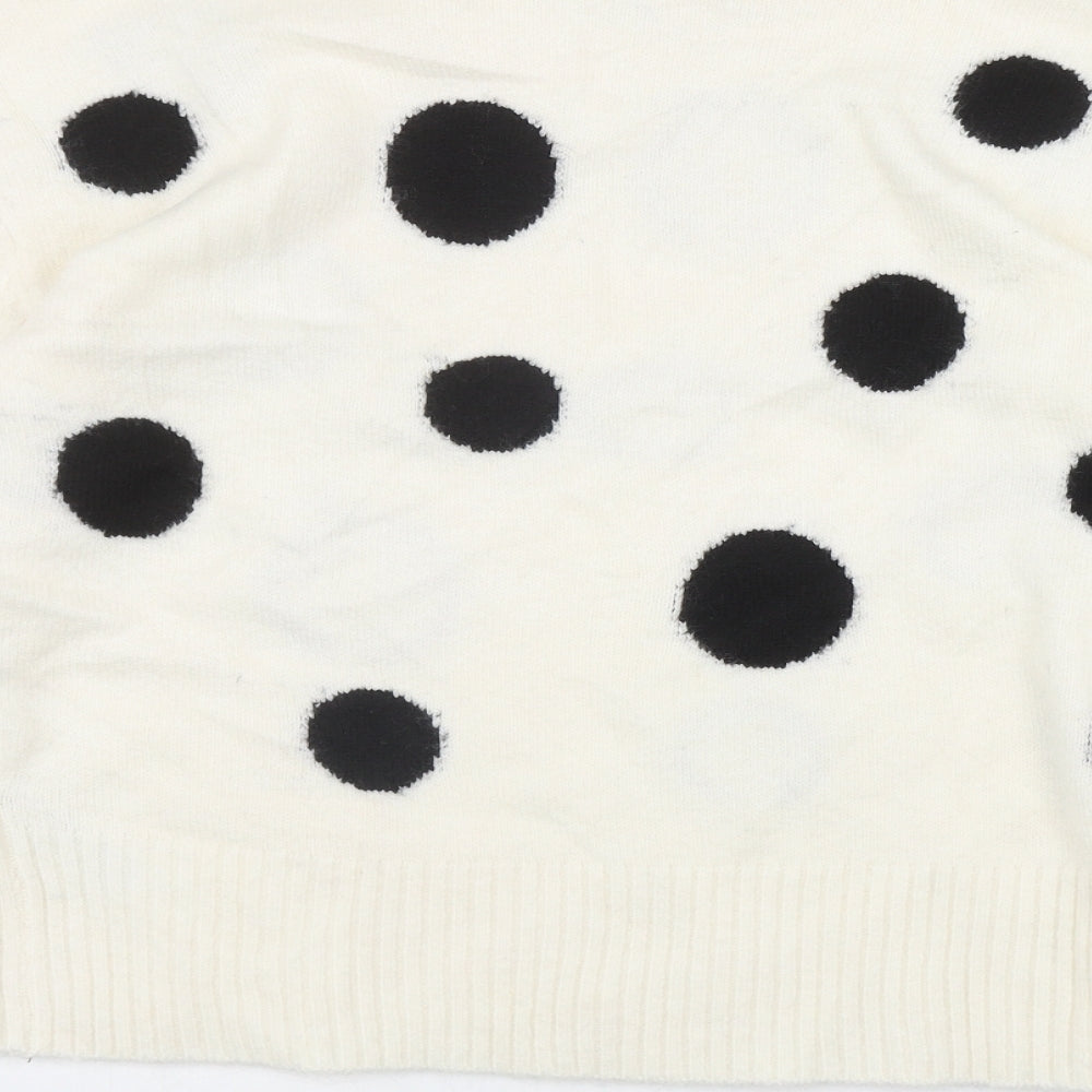 Brand and care label for Marks & Spencer women’s ivory mock neck polka dot acrylic jumper, size M