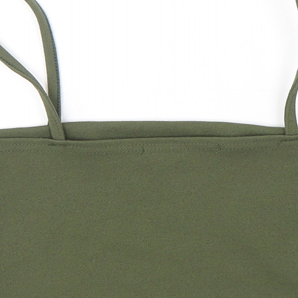 Brand and care label for Parisian women’s green polyester cropped tank, size UK 10, off the shoulder