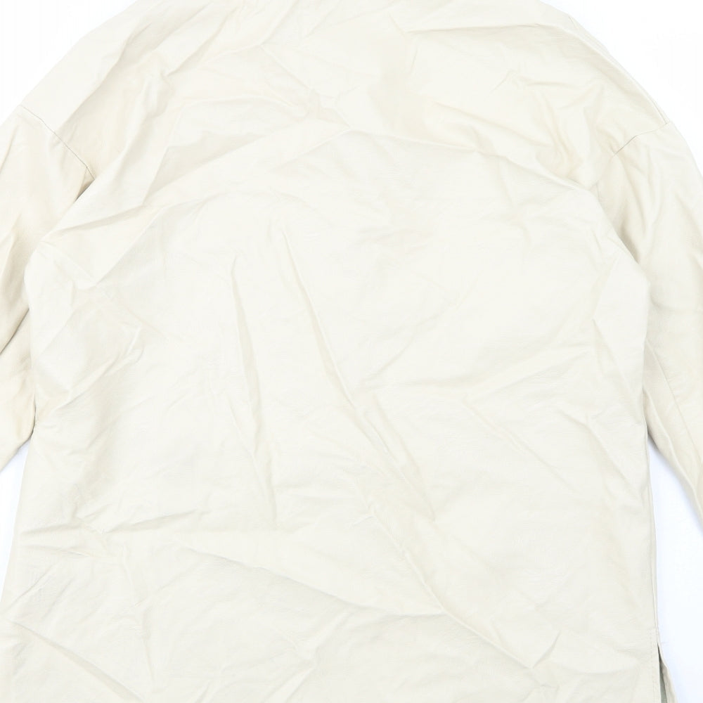 Brand and care label for Boohoo women’s beige pea coat coat, size UK 10, button