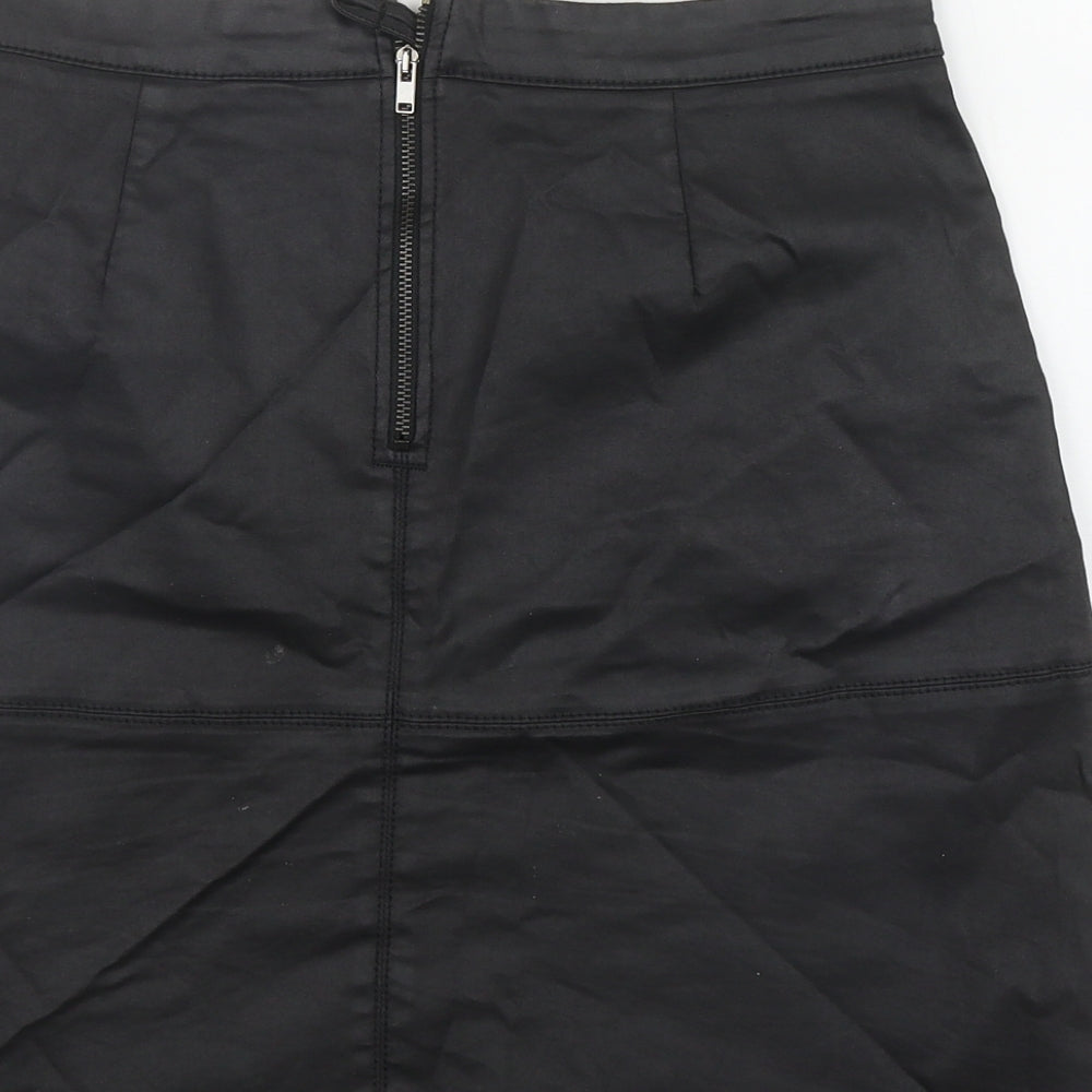 Brand and care label for Next women’s black cotton a-line skirt, size UK 10, zip