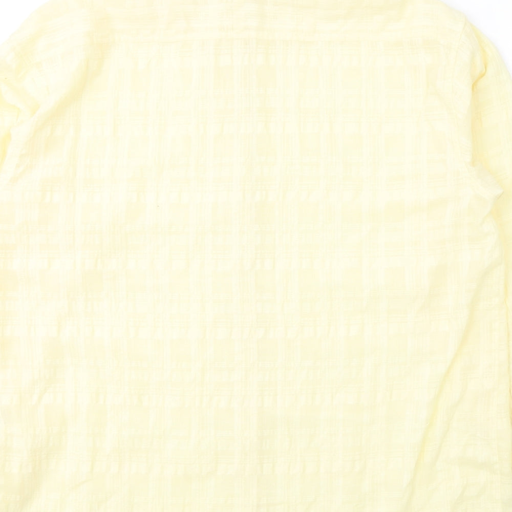 Brand and care label for Damart women’s yellow polyester basic button-up, size UK 16, round neck