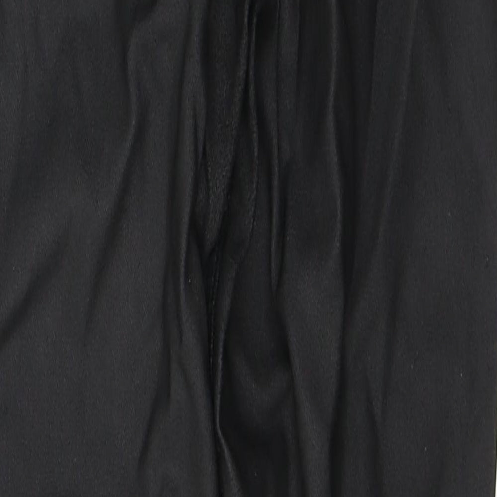 Brand and care label for Urban Bliss women’s black viscose skinny jeans, size UK 10, 28-inch leg regular button